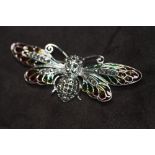 A LARGE SILVER PLIQUE A JOUR WINGED INSECT BROOCH / PENDANT, set with cabochon ruby eyes and