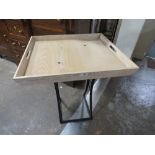 A MODERN LIMED STYLE OCCASIONAL TABLE WITH BLACK METAL BASE