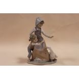 A LLADRO FIGURE GROUP OF A MOTHER AND CHILD WITH A GOOSE