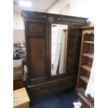 AN EARLY 20TH CENTURY OAK MIRRORED WARDROBE WITH DRAWER TO THE BASE H 203 cm, W 158 cm