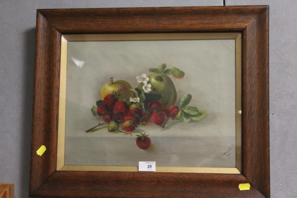 AN OAK FRAMED AND GLAZED OIL ON CANVAS SILL LIFE STUDY OF FRUIT SIGNED L. GROVES 1915