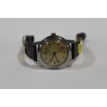 A VINTAGE GENTS P BUHRE WRISTWATCH ON LEATHER STRAP