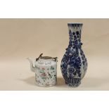 A CHINESE CERAMIC TEA POT TOGETHER WITH A VASE DECORATED WITH DRAGONS, BOTH STAMPED TO BASE