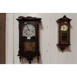 TWO REPRODUCTION VINTAGE WALL CLOCKS