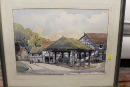 A FRAMED AND GLAZED WATERCOLOUR SIGNED R. CRIPPOOL DEPICTING A COTSWOLD MARKET SCENE