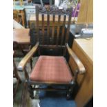 A 1920s / 30s OAK ARMCHAIR