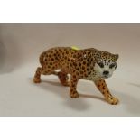 A BESWICK GLOSS FINISH FIGURE OF A LEOPARD