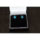 A PAIR OF NEON BLUE APATITE SILVER STUD, boxed