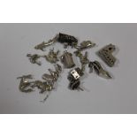 A BAG OF SILVER BRACELET CHARMS, APPROX WEIGHT 48.3G