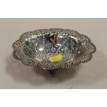 A HALLMARKED SILVER EMBOSSED BOWL RAISED ON PAW FEET APPROX WEIGHT - 140G