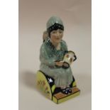 A KEVIN FRANCIS CERAMICS FIGURE OF CLARICE CLIFF, STAMPED PROPERTY OF KEVIN FRANCIS, NOT FOR RESALE