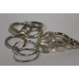 A BAG OF SILVER HOOP EARRINGS APPROX WEIGHT - 25.1G