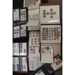 A COLLECTION OF STAMP ALBUMS AND FIRST DAY COVERS TO INCLUDE PENNY BLUES AND PENNY REDS ETC