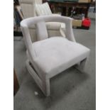 A MODERN GREY SUEDE OPEN ARMCHAIR