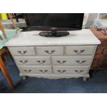 A MODERN FRENCH STYLE SEVEN DRAWER CHEST, H 80 cm, W 122 cm D 48 cm