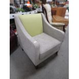 A MODERN RETRO STYLE ARMCHAIR