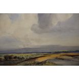 AN UNFRAMED WATERCOLOUR OF AN EXTENSIVE LANDSCAPE SIGNED JOHN WILSON LOWER RIGHT