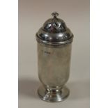 A HALLMARKED SILVER SUGAR CASTOR WITH TWIST TOP APPROX WEIGHT - 147.4G