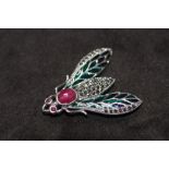 A LARGE SILVER PLIQUE A JOUR FLY BROOCH / PENDANT, set with cabochon ruby, ruby eyes and marcasites