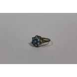 A 9 CARAT GOLD BLUE TOPAZ SET DRESS RING SIZE P APPROX WEIGHT - 2.5G