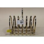 A HALLMARKED SILVER SIX DIVISION TOAST RACK APPROX WEIGHT- 278.9G