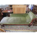 AN ANTIQUE MAHOGANY CARVED CHAISE LONGUE