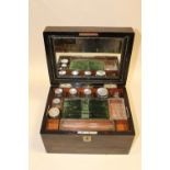 A VICTORIAN COROMANDEL LADIES VANITY BOX WITH FITTED INTERIOR, HAVING VANITY JARS WITH HALLMARKED