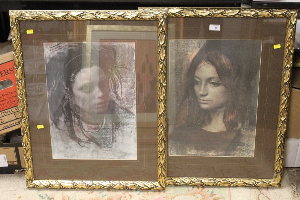 A PAIR OF GILT FRAMED AND GLAZED HEAD AND SHOULDER PORTRAIT PRINTS OF YOUNG LADIES