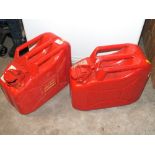 TWO RED JERRY CANS