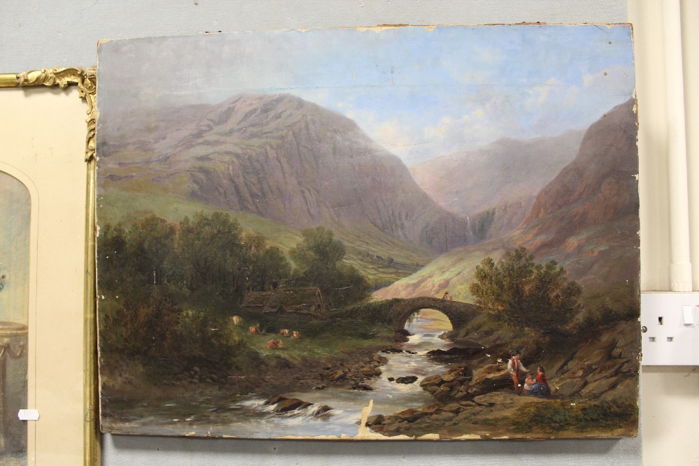 AN UNFRAMED ANTIQUE OIL ON CANVAS DEPICTING A MOUNTAINOUS RIVER SCENE WITH FIGURES AND CATTLE S/D