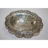 A HALLMARKED SILVER EMBOSSED BOWL RAISED ON PAW FEET APPROX WEIGHT - 140G