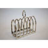 A HALLMARKED SILVER SIX DIVISION TOAST RACK APPROX WEIGHT- 278.9G