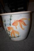 A LARGE GLAZED CERAMIC PLANTER DECORATED WITH GOLD FISH