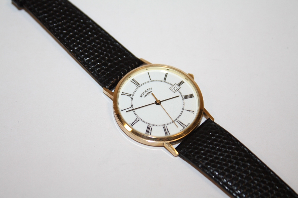 A YELLOW METAL ROTARY DATE WRISTWATCH