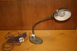 A VINTAGE BRASS ADJUSTABLE TABLE LAMP