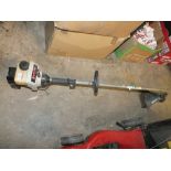 A RYOBI PETROL STRIMMER