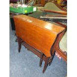 AN EDWARDIAN MAHOGANY SUTHERLAND TABLE