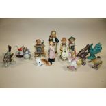 A COLLECTION OF ASSORTED CERAMIC FIGURES TO INCLUDE GOEBEL, ROYAL DOULTON AND BESWICK EXAMPLES