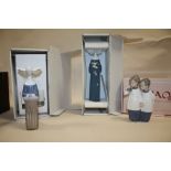 TWO BOXED LLADRO NUN FIGURES, TOGETHER WITH A BOXED NAO FIGURE OF CHOIR BOYS (ONE A/F)
