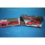 TWO BOXED REMOTE CONTROL FERRARI CARS TO INCLUDE NIKKO EXAMPLE