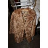 A LADIES VINTAGE FUR COAT