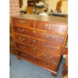 AN ANTIQUE OAK 7 MAHOGANY CHEST OF 2 SHORT ABOVE 3 LONG GRADUATED DRAWERS RAISED ON BRACKET FEET H-