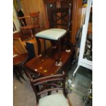 A REPRODUCTION MAHOGANY DROPLEAF DINING TABLE AND FOUR CHAIRS