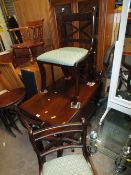 A REPRODUCTION MAHOGANY DROPLEAF DINING TABLE AND FOUR CHAIRS