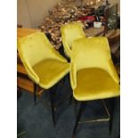 A SET OF THREE MODERN GOLD BAR STOOLS