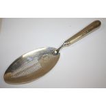 A HALLMARKED SILVER EIGHTEENTH CENTURY FISH SLICE