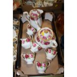 A TRAY OF ROYAL ALBERT OLD ENGLISH ROSE CHINA TO INCLUDE TEAPOT, LIDDED JUG ETC