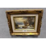 A SMALL GILT FRAMED OIL ON BOARD DEPICTING A SNOWY RURAL SCENE WITH HORSES PULLING A SLEIGH