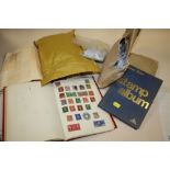 TWO STAMP ALBUMS AND CONTENTS TOGETHER WITH A QUANTITY OF LOOSE VINTAGE STAMPS