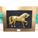 A BRONZE TYPE WALL MOUNTABLE PLAQUE OF A HORSE
